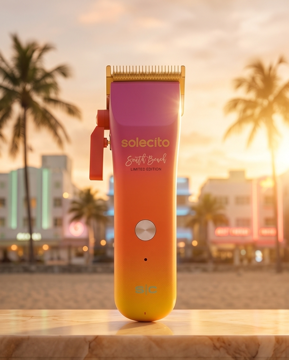 Professional hair clipper standing upright with purple head and orange-to-yellow gradient body